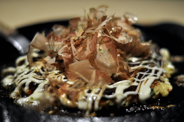 Okonomiyaki is a common Japanese food, and is  popular in mostly Kansai region as Osaka, Kyoto and more. It has a great and deep taste. There are many kinds of types of Okonomiyaki, which have pork, seafood,rice cake, and cheese. 