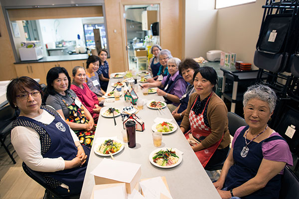 Vancouver’s Shako Club shares a meal they prepared in Tonari Gumi’s industrial kitchen in June, as part of a project organized by the grunt gallery and artist Cindy Mochizuki.